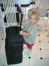 Scott has Daddy's luggage.JPG (45470 bytes)