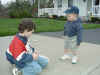Zach & Scott chalk up the driveway.jpg (83250 bytes)
